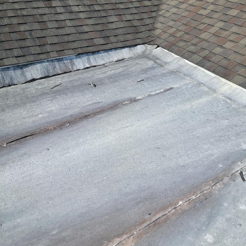 Flat roof elite panel with damaged seams and wear Flat roof elite panel with damaged seams and wear