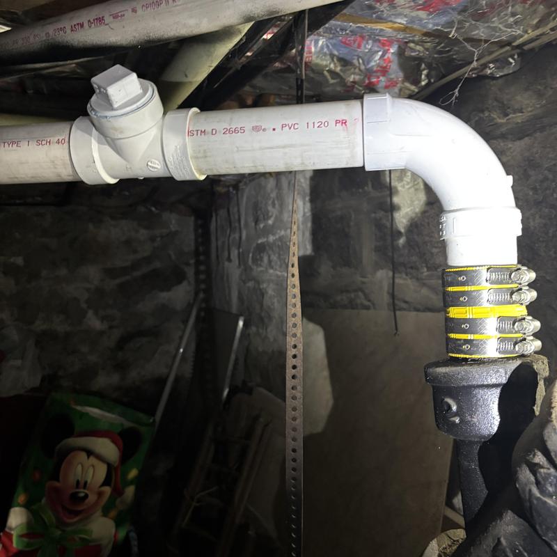 2-inch PVC drain pipe with cleanout and hangers