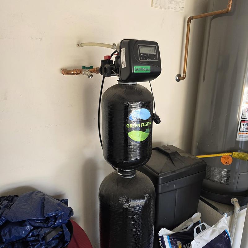 Water softener system with filtration unit installed Water softener system with filtration unit installed