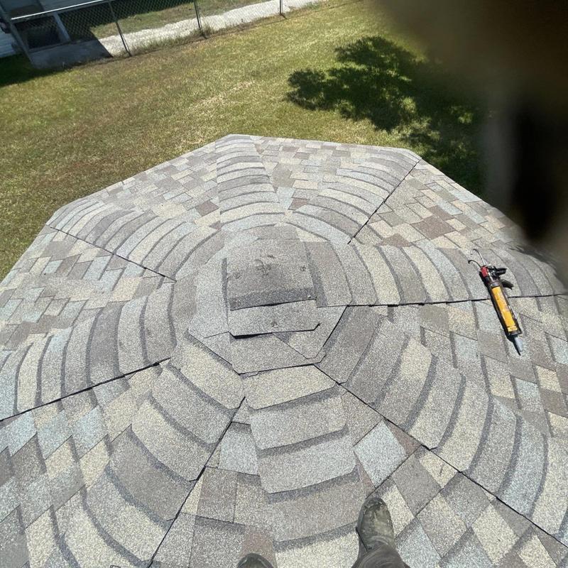Architectural shingle shed roof with ridge vent installation
