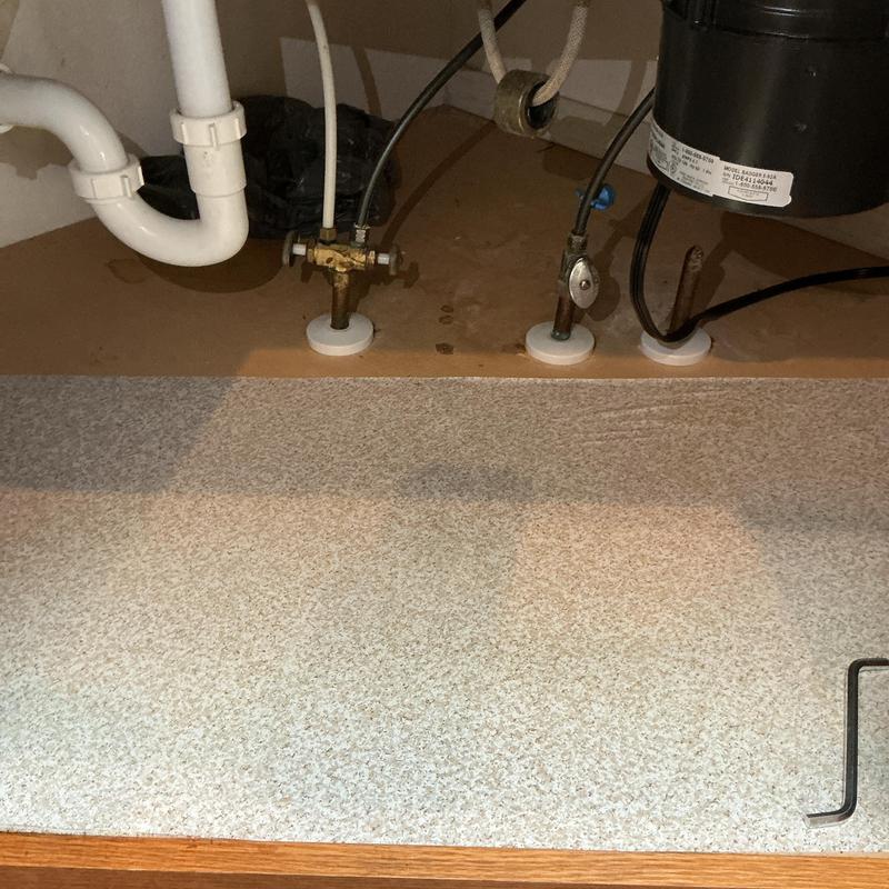 Garbage disposer plumbing connections under sink Garbage disposer plumbing connections under sink