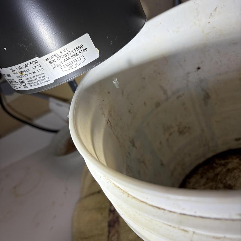 12 HP garbage disposal above dirty bucket interior 12 HP garbage disposal above dirty bucket interior
