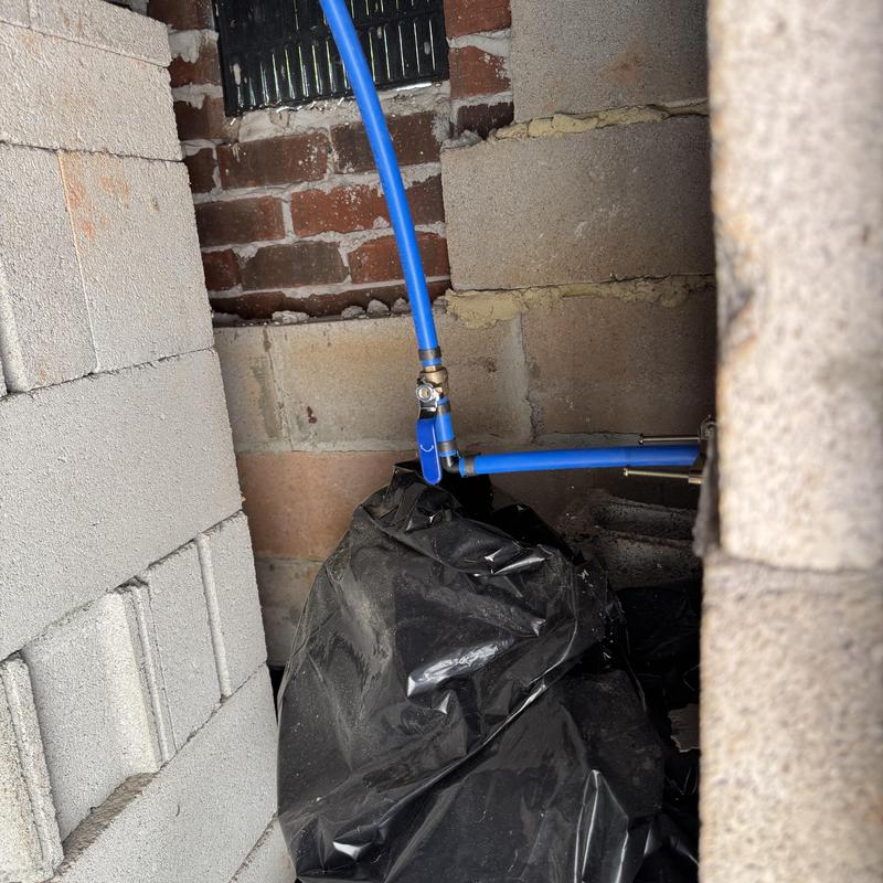 Frost proof hose bib with blue piping installation Frost proof hose bib with blue piping installation