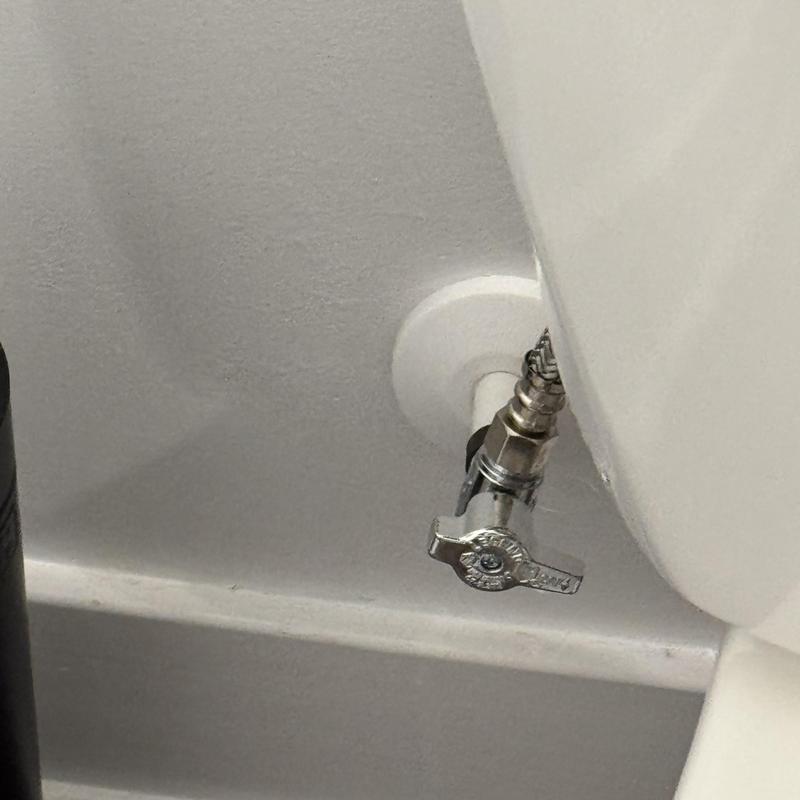 Toilet shut off valve chrome fitting near wall Toilet shut off valve chrome fitting near wall