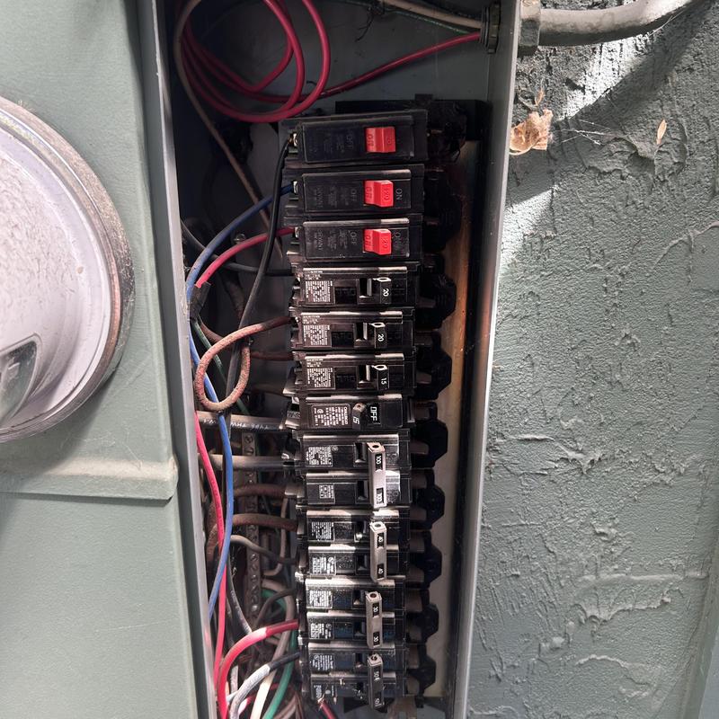 Electrical breaker panel with multiple circuit breakers inside Electrical breaker panel with multiple circuit breakers inside