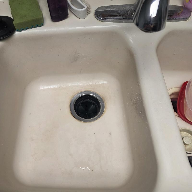 Kitchen sink drain opening with garbage disposal flange