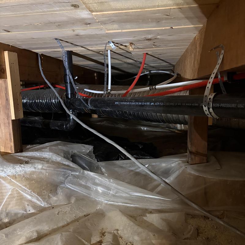 ABS kitchen drain pipe installation in crawl space ABS kitchen drain pipe installation in crawl space