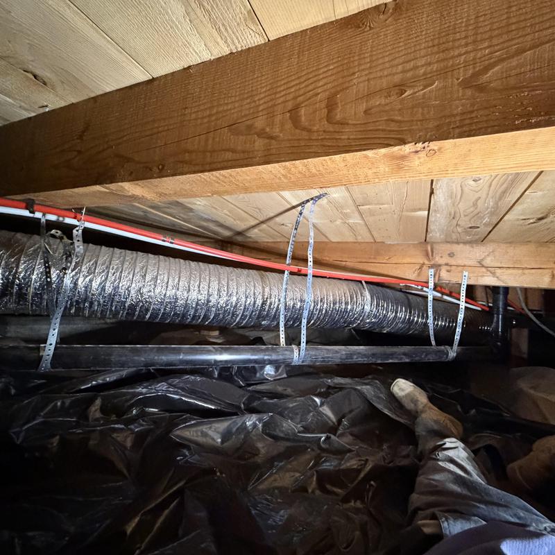 Kitchen ABS drain piping replaced and strapped in crawlspace Kitchen ABS drain piping replaced and strapped in crawlspace