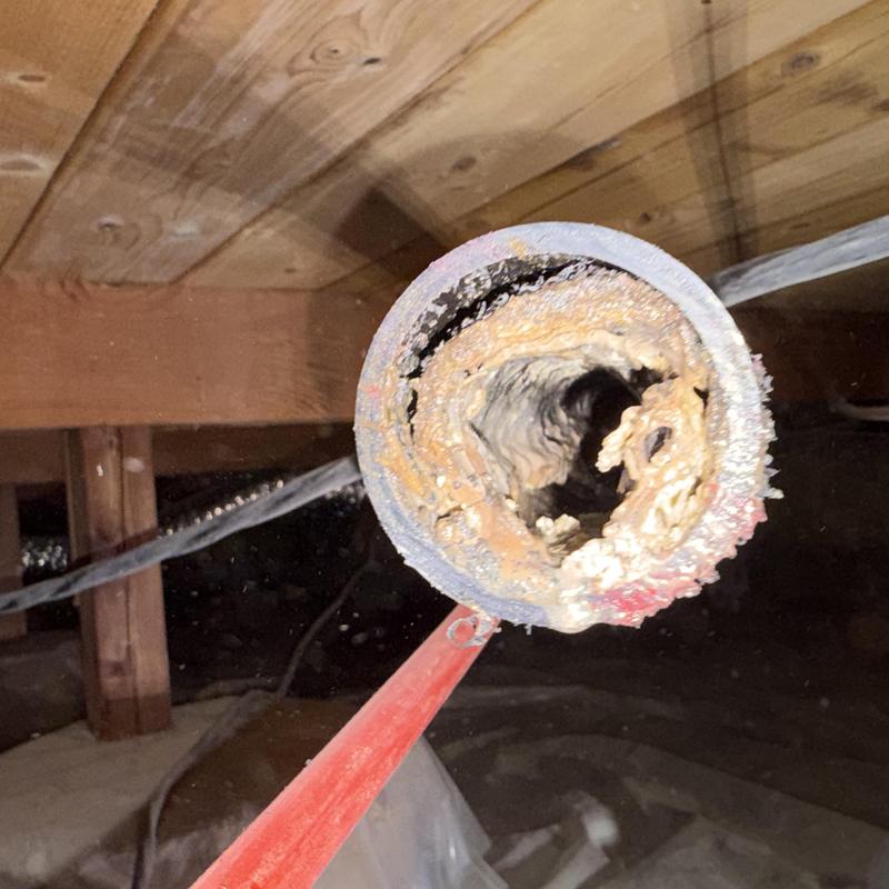 Kitchen drain pipe clogged with heavy buildup inside Kitchen drain pipe clogged with heavy buildup inside