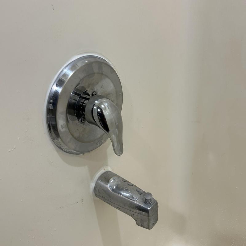 Shower valve and tub spout in white surround Shower valve and tub spout in white surround