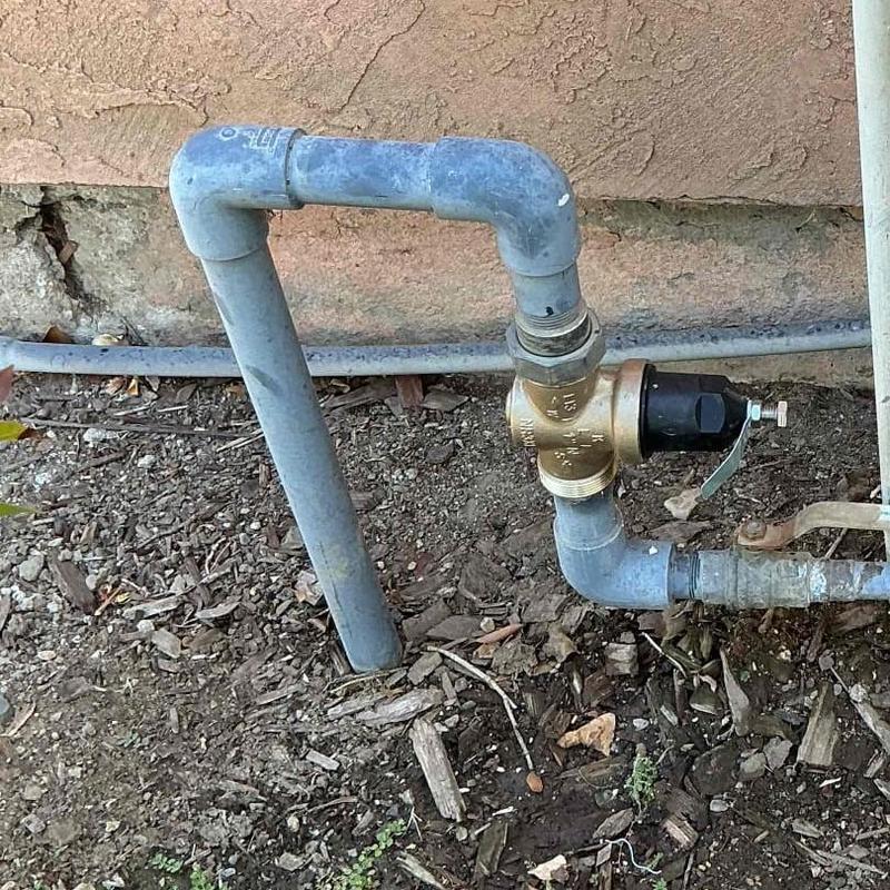 Pressure Reducing Valve with new fittings installed outdoors