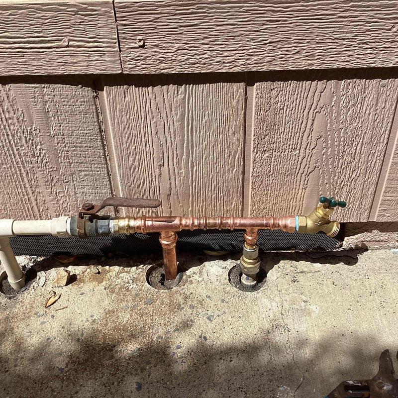 Copper water supply line with shutoff valve and faucet