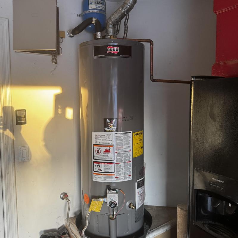 50-gallon Ruud gas water heater installed in garage