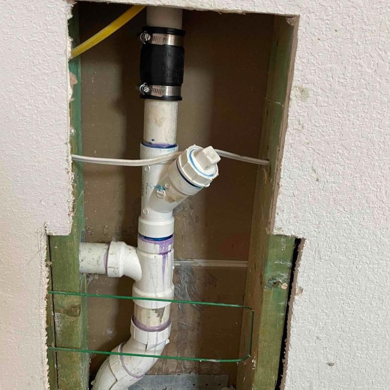 Sewer cleanout and kitchen drain pipe installation Sewer cleanout and kitchen drain pipe installation