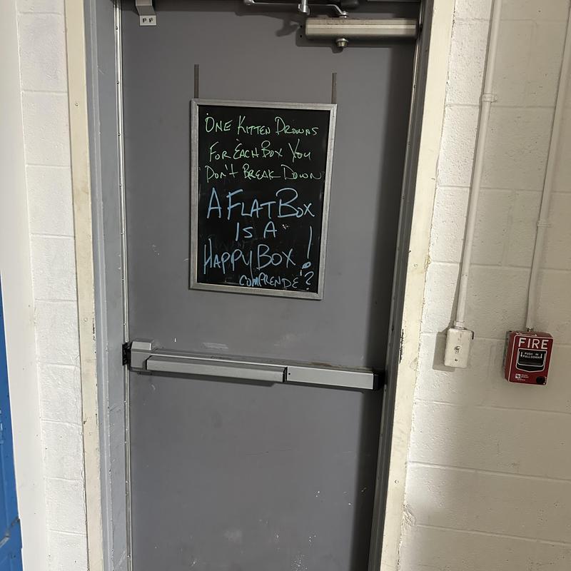 Exit security bar on back emergency door with sign Exit security bar on back emergency door with sign