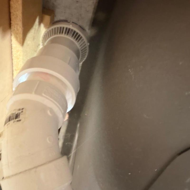 Tubular drain pipe with studor vent under sink