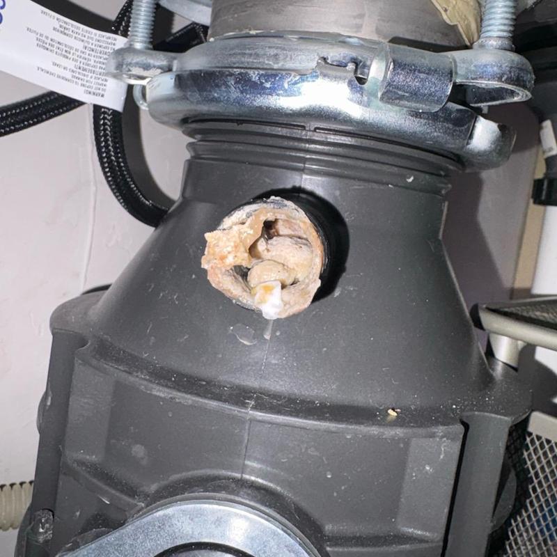 Dishwasher air gap clog on garbage disposal unit Dishwasher air gap clog on garbage disposal unit