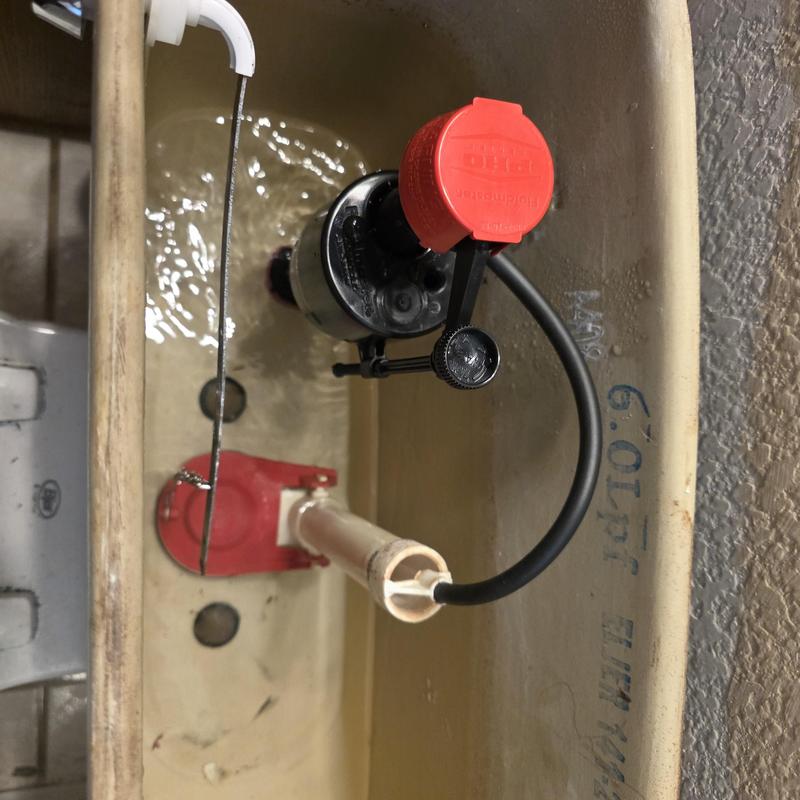 Toilet fill valve and flapper inside tank, Queen Creek
