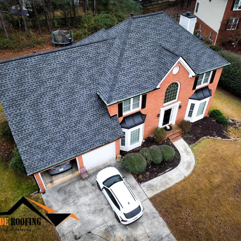 GAF Timberline HDZ charcoal roof with gutters