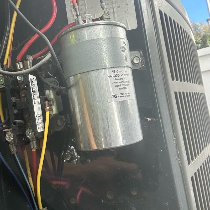 AC unit capacitor replacement inside service panel