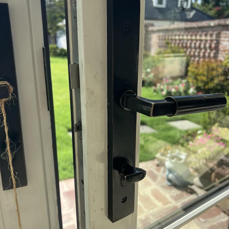 Multipoint lock on glass patio door with black handle Multipoint lock on glass patio door with black handle