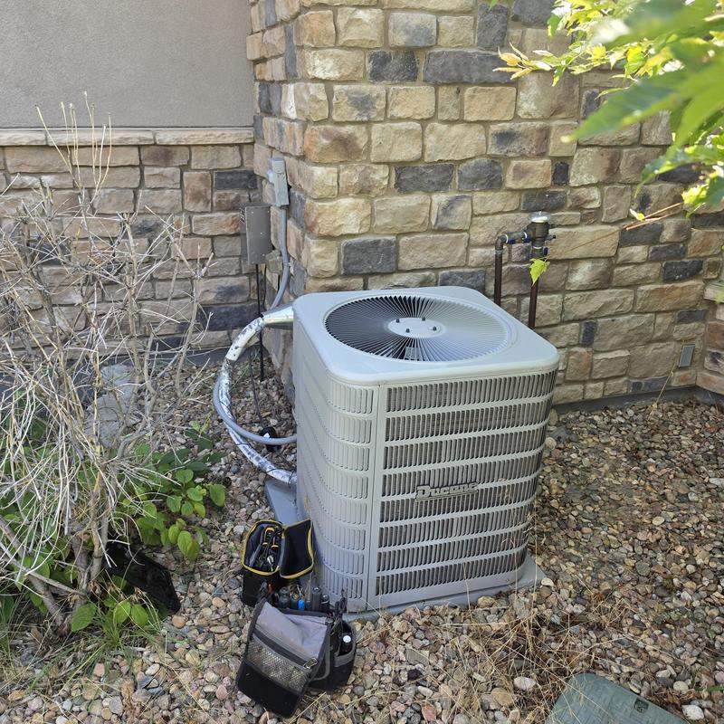 Ducan air conditioner unit with repair tools nearby Ducan air conditioner unit with repair tools nearby