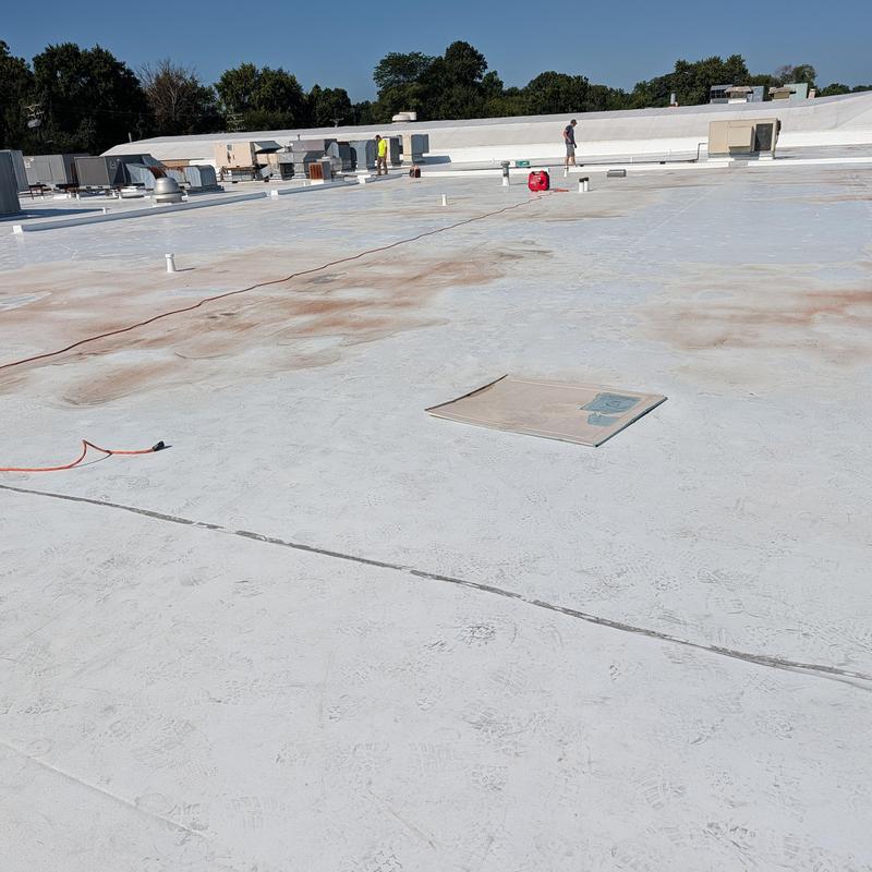 TPO roofing membrane with leak inspection and repairs