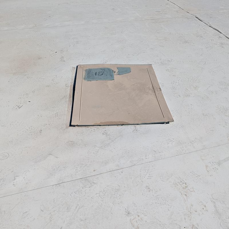 TPO roofing membrane with patched tear on roof panel