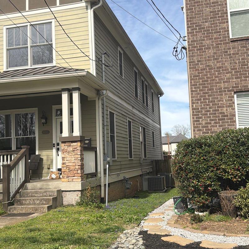 Asphalt shingle roof with visible hail damage inspection