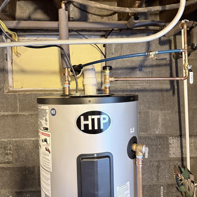 Water heater with new lifetime warranty tank installed