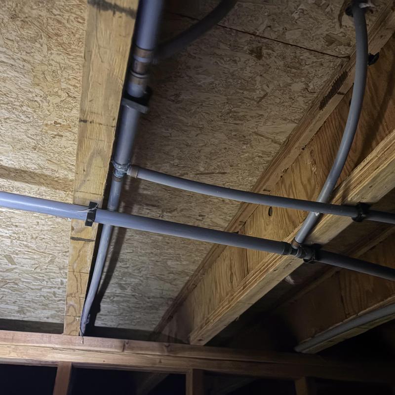 Main water shutoff pipes in crawl space ceiling