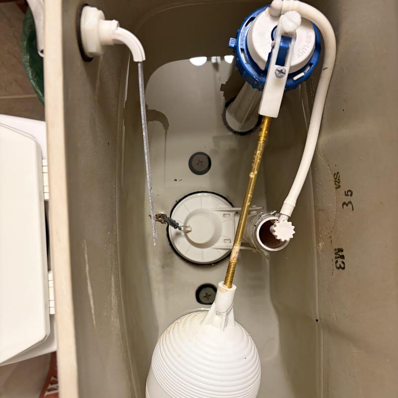 Toilet tank fill valve and float mechanism inside