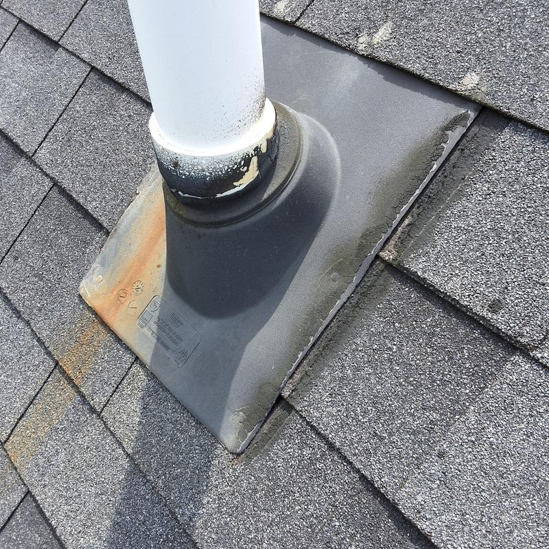 Plumbing vent collar on asphalt shingle roof Plumbing vent collar on asphalt shingle roof