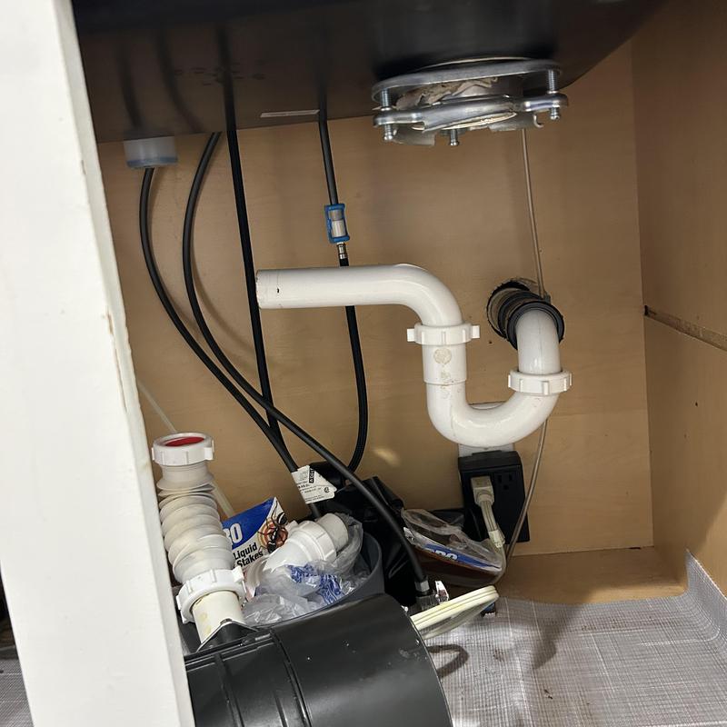 Garbage disposal disconnected under kitchen sink