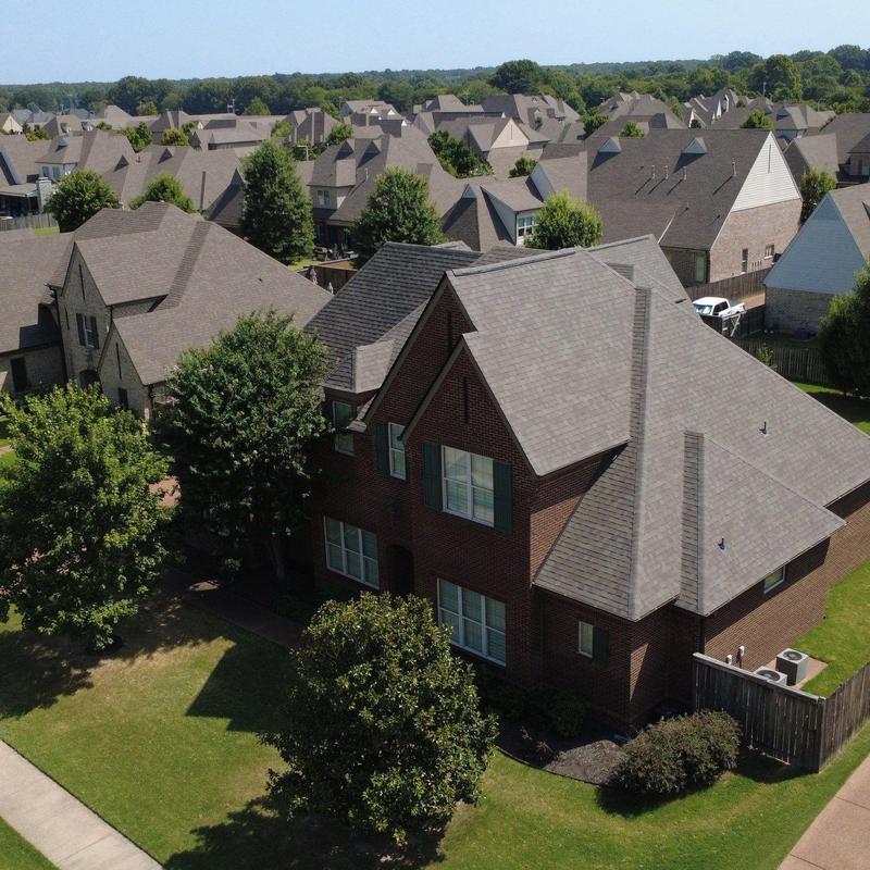 Driftwood shingle roof replacement on brick home