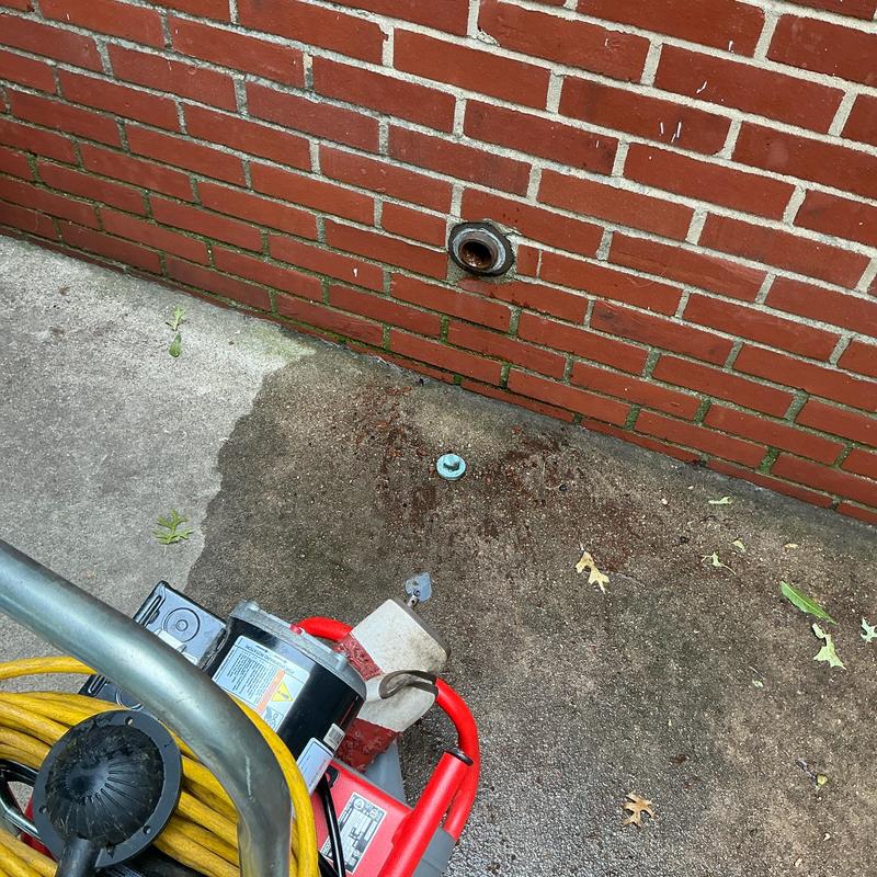Kitchen drain line with cable and motor equipment outdoors