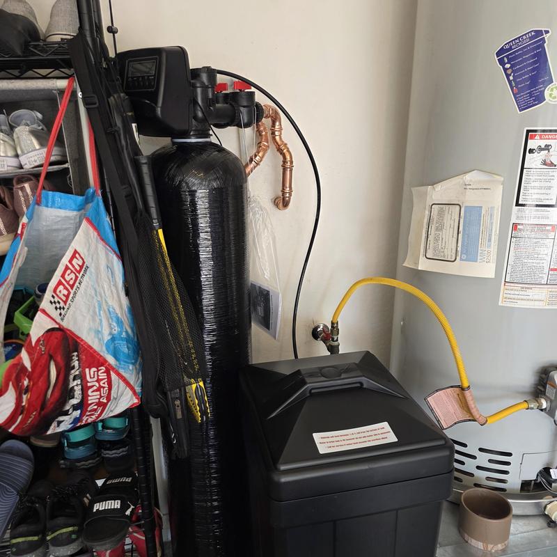 48k grain water softener system installed in garage