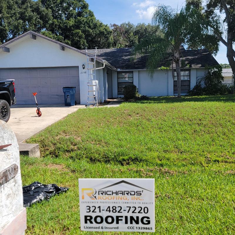 Roof inspection with ladder and Owens Corning shingles Roof inspection with ladder and Owens Corning shingles