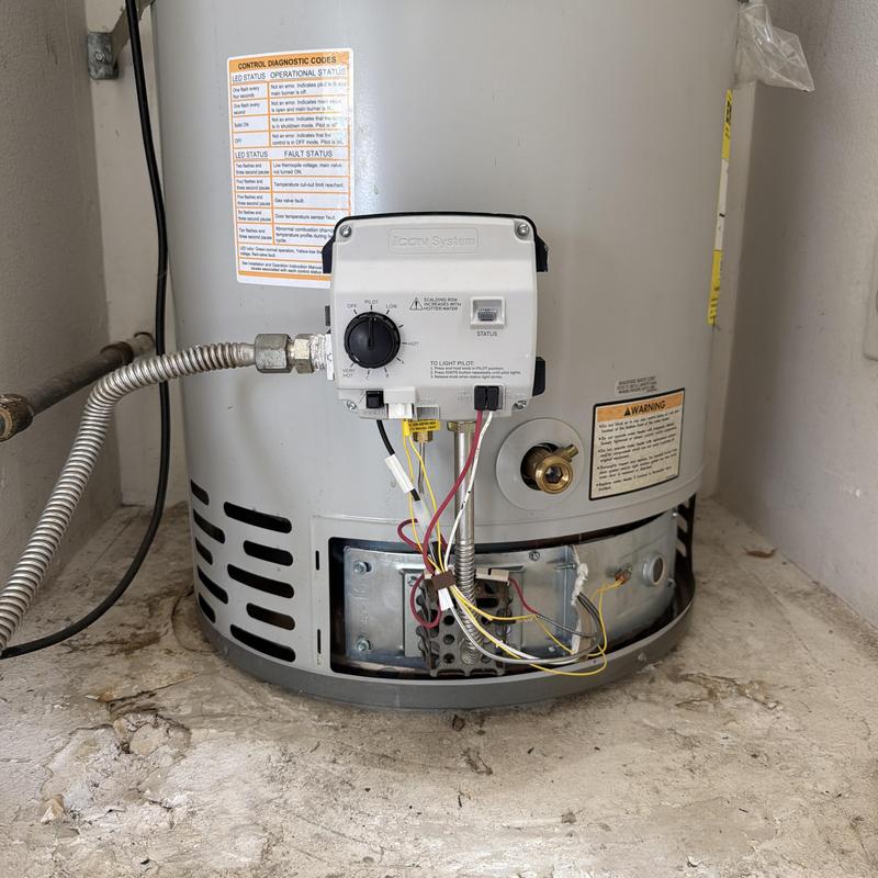 Water heater burner assembly with control valve installed
