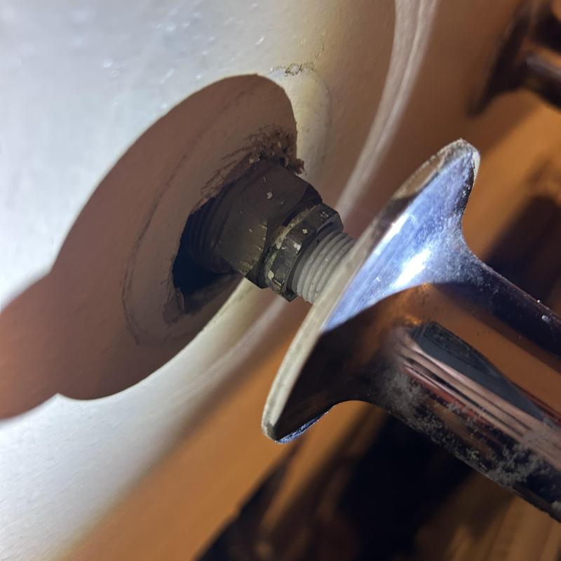 Laundry valve connection leaking behind wall plate