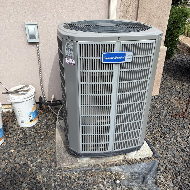American Standard heat pump outdoor unit on pad