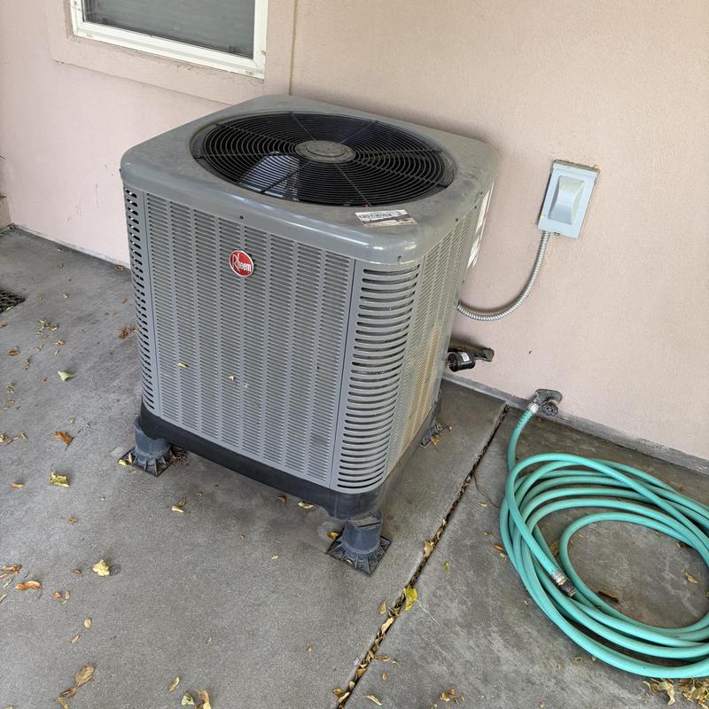 Rheem outdoor heat pump unit with maintenance setup