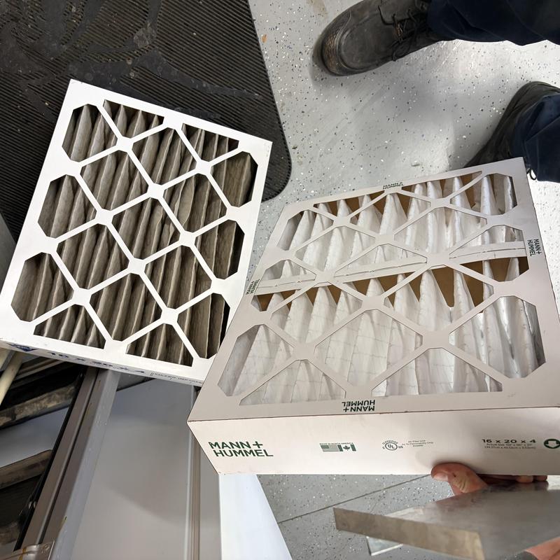16x20x4 HVAC air filters being replaced and installed