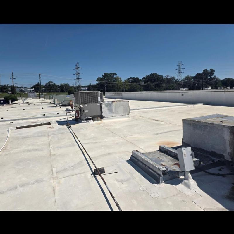 TPO roof at Sun King restaurant with HVAC units TPO roof at Sun King restaurant with HVAC units