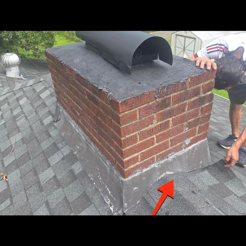 Chimney flashing inspection on shingle roof Chimney flashing inspection on shingle roof