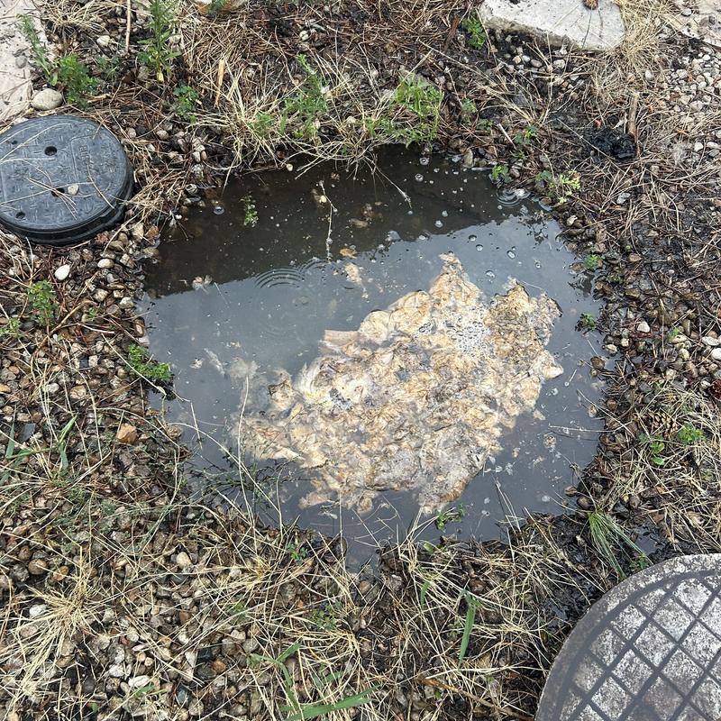 Sewer lift station flooded with wastewater and debris
