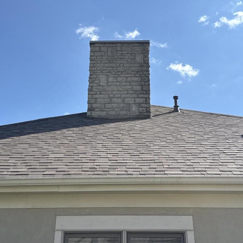 Stone chimney flashing and roof shingles replacement Stone chimney flashing and roof shingles replacement