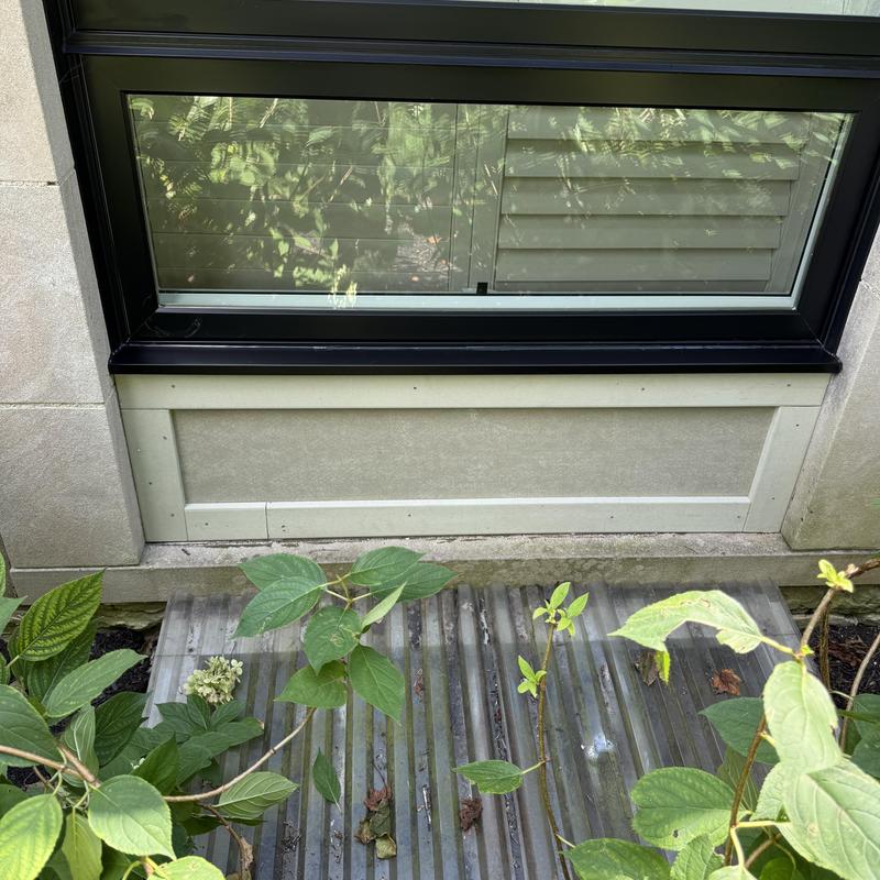Window replacement with black metal flashing trim Window replacement with black metal flashing trim