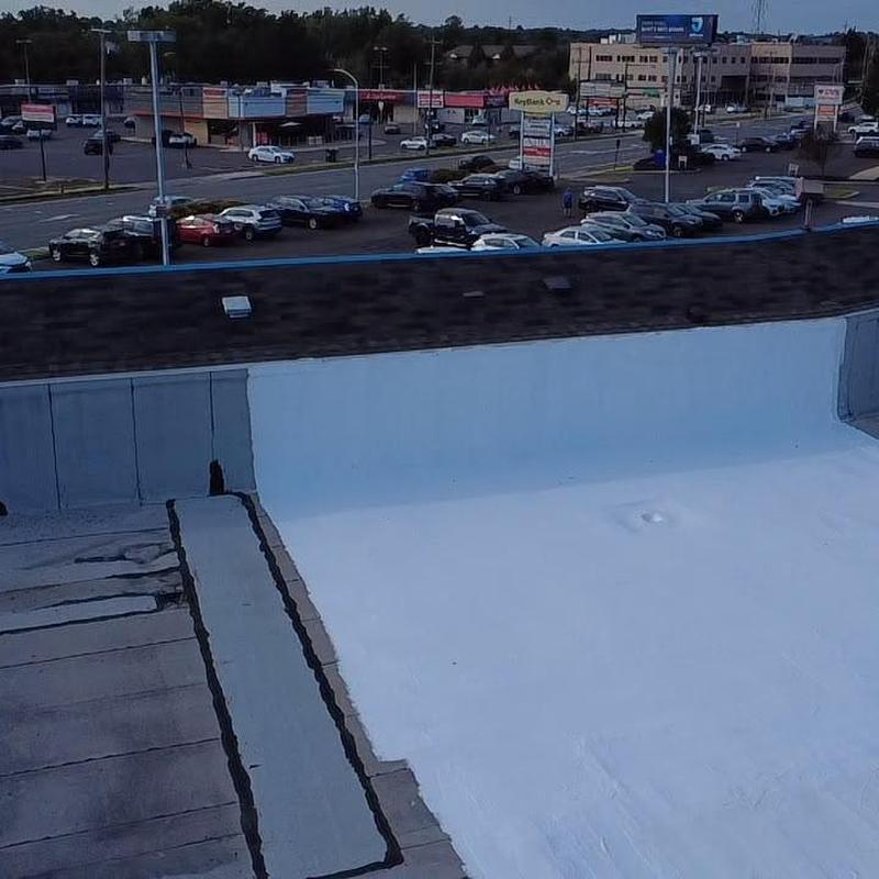 Bulldog silicone roof coating on commercial flat roof