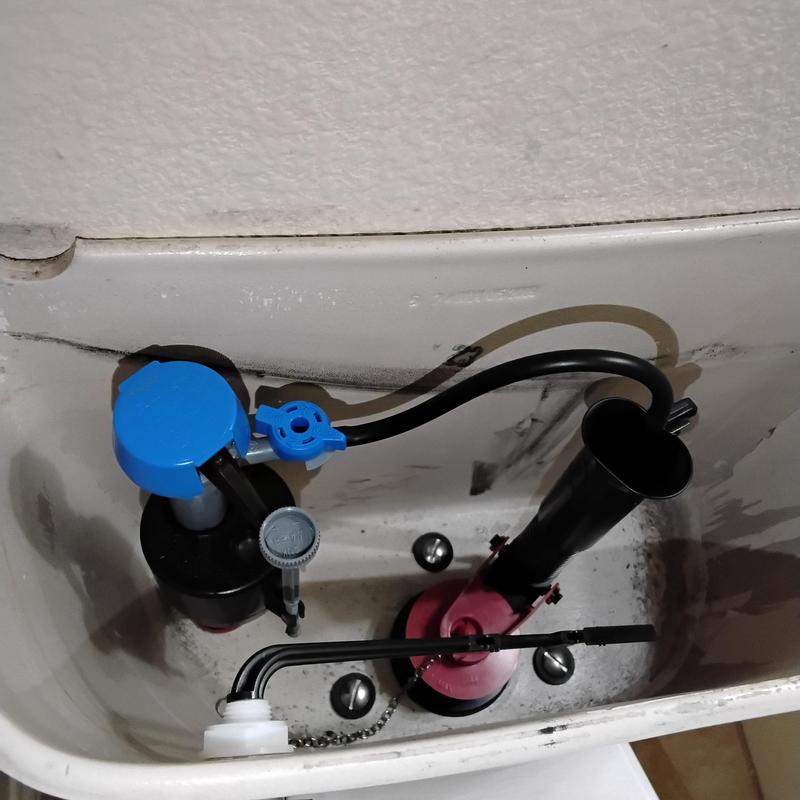 Toilet tank rebuild with new gasket and shut-off valve Toilet tank rebuild with new gasket and shut-off valve